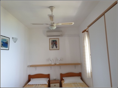 1B - ceiling fan and aircondition above beds